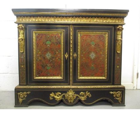 A Napoleon III ebonized and boulle cabinet by Hyppolite Edmee Pretot with gilt metal and ormolu mounts, a black marble top, o