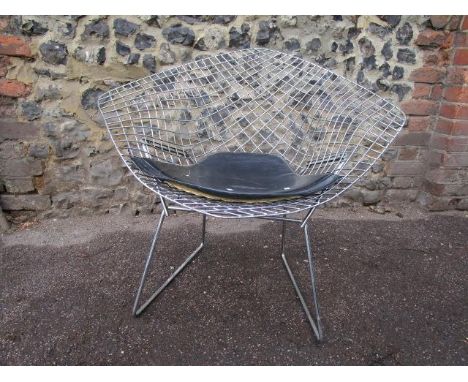 Harry Bertoia 1915-1978 design for Knoll International in 1952, a wire diamond chair with sled base and black seat pad, model