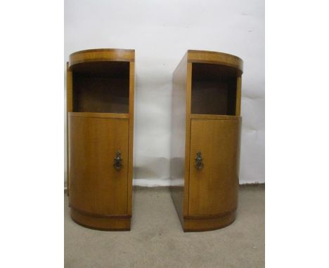 Betty Joel 1894-1985, Token Works - a pair of satinwood and crossbanded bedside cabinets having curved front, single door wit