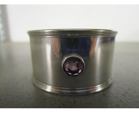 William Robb of Ballater, a Scottish provincial design silver napkin ring of simple form with a single collet set amethyst, E