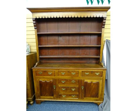 WELSH DRESSER-MAHOGANY, OAK AND PINE with a 3-shelf rack over 3 centre opening drawers, a false base drawer and a drawer and 