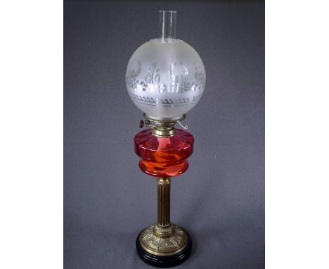 OIL LAMP on brass Corinthian column with cranberry glass reservoir and etched shade