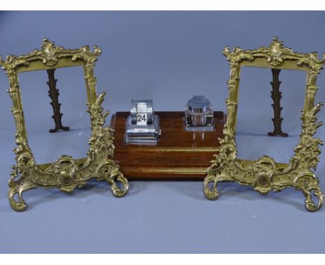 PAIR OF GILT METAL EASEL PORTRAIT FRAMES and a neat mahogany based chrome calendar and ink bottle stand set