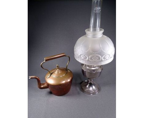 GEORGIAN COPPER KETTLE with acorn knob and a chrome based oil lamp with patterned semi opaque shade 
