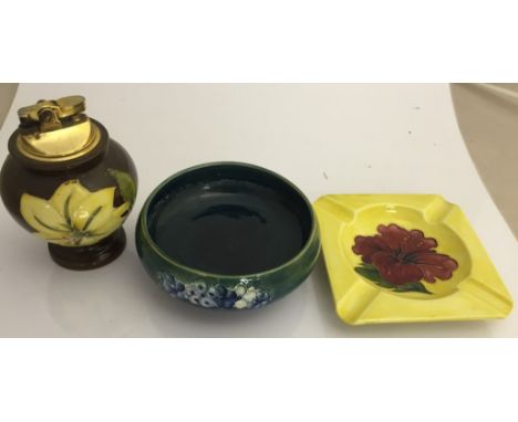 A Moorcroft lighter; together with an ashtray and bowl