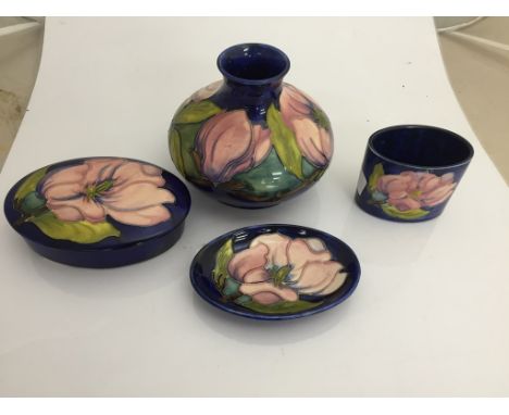 Four pieces of Moorcroft to inc vase, trinket box etc decorated with pink flowers