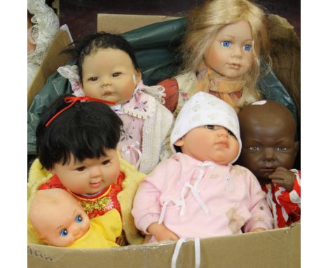 A quantity of Collectors dolls; to include Berenguer black baby doll, Leonardo Collectors porcelain doll, a kewpie doll, a bl