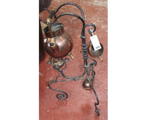 Dr Christopher Dresser for Benham & Froud, a copper and brass kettle on a wrought iron stand, with a burner, a cream jug (lac