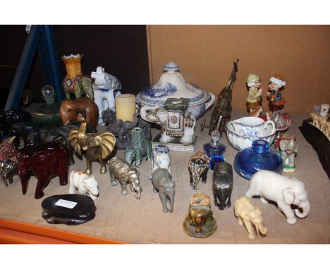 A quantity of assorted ceramic, ebony and other elephants and other items 