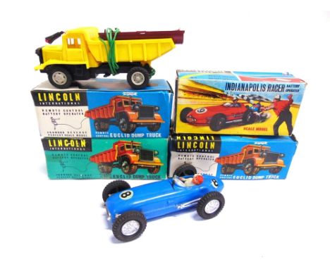 FOUR HONG KONG PLASTIC MODEL VEHICLES  comprising three Lincoln International battery-operated remote control Euclid Dump Tru