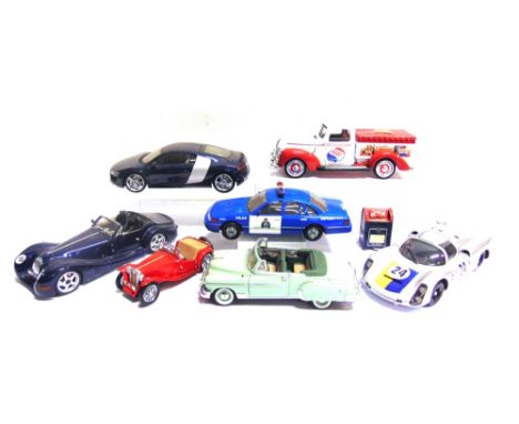 SEVEN ASSORTED DIECAST MODEL VEHICLES  comprising a 1/18 scale Exoto Motorbox Porsche 910, silver; 1/18 scale Kyosho Audi R8,