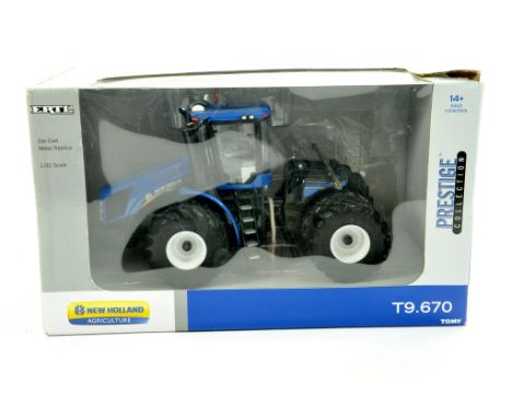 Ertl 1/32 farm Issue comprising Prestige Collection New Holland T9.670 Tractor. Excellent and secured within original box.  E