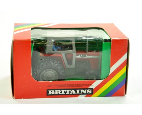 Britains 1/32 farm issue comprising Massey Ferguson 595 Tractor with Rear Dual Wheels. Excellent in very good to excellent or