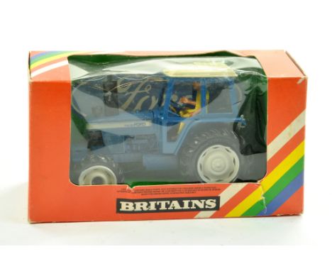 Britains 1/32 farm issue comprising Ford TW20 Tractor. Excellent in good to very good box.  Enhanced Condition Reports: We ar