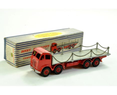 Dinky No. 905 Foden Flat Truck with Chains. Type 2 version is red and light grey. Red Supertoys Hubs. Generally good, some no