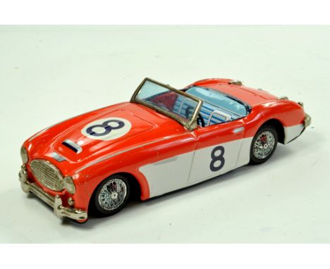 Bandai Tinplate Friction Driven Austin Healey. Two Tone Red and White. Approx 21cm. Some light wear but displays superbly hen