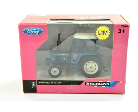 Britains 1/32 Farm issue comprising Ford 6600 (Q Cab) Tractor. Excellent and secured within faded original box.  Enhanced Con