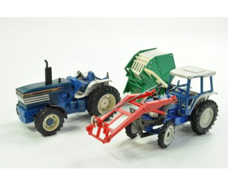 Duo of Britains Tractor issues comprising Ford TW35 Powerfarm and 5610. Spares. Repairs.  Enhanced Condition Reports: We are 