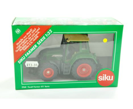 Siku 1/32 Farm Issue comprising Fendt Farmer 411 Tractor. Excellent, complete and looks to be never removed from box. Enhance