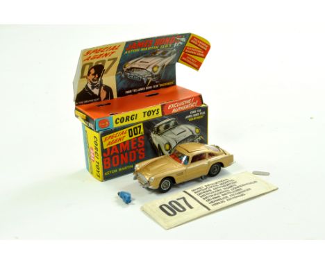 Corgi No. 261 James Bond Aston Martin DB5 taken from the film Goldfinger with first issue gold body, red interior with James 