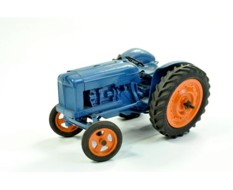 Chad Valley 1/16 Farm issue comprising Fordson Major Tractor. Mechanical example however has seized. Some restoration to whee