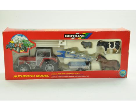 Britains 1/32 Farm issue comprising No. 9665 Massey Ferguson 3680 Tractor, (blue) Ploughs and Trailer Gift Set (first issue).