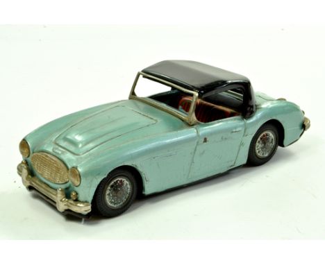 Bandai Tinplate Friction Driven Austin Healey Hardtop. Light Blue. Approx 21cm. Some light wear but displays well hence gener