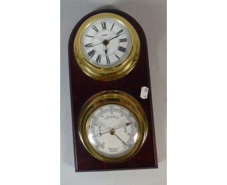 A Modern Wall Hanging Ships Clock and Barometer on Mahogany Base. 31cm High