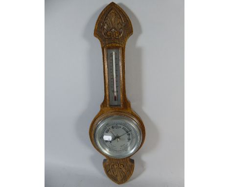 A Late Victorian Oak Wheel Barometer with Temperature Scale, 57cm High