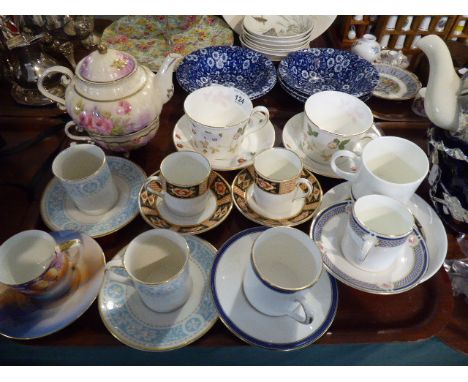 A Tray of Coffee Cans and Saucers to include Wedgwood Wild Strawberry, Royal Doulton Hampton Court, Noritake, Spode Etc