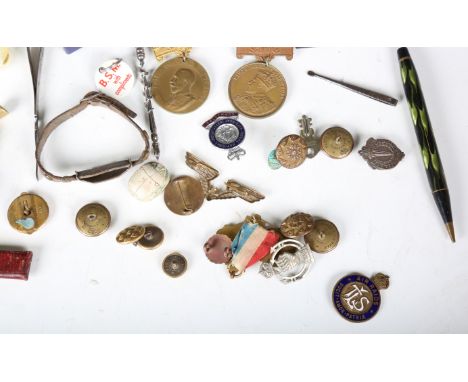 A mixed group of collectors' items, including a lady's silver cased wristwatch, a bronze pipe tamper and seal in the form of 