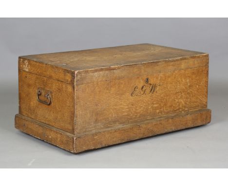 A large 19th century scumbled pine trunk, the painted surface imitating pale oak, the front bearing initials 'E.G.W.', height