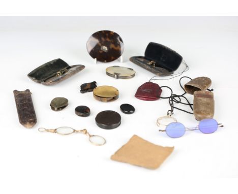 A pair of early 20th century yellow metal folding spectacles, a late 19th century Continental silver and mother-of-pearl fold