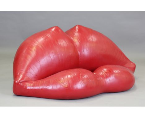 A Louis Durot red polyurethane and foam 'Léchauffeuse' sofa sculpture, modelled as a pair of lips, circa 1980, height 65cm, w