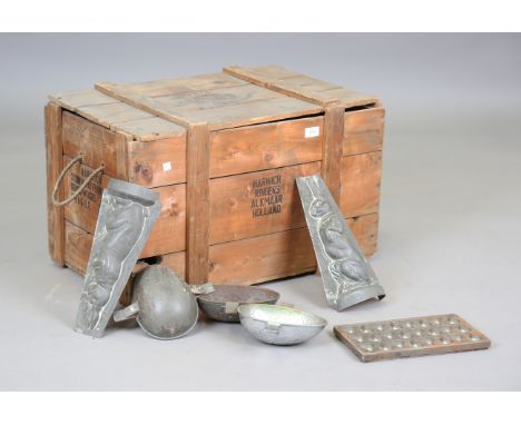 A large quantity of mid-20th century tin confectionary moulds, mainly Easter-related shapes, such as eggs, rabbits and gnomes