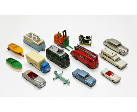 An assorted collection of Dinky diecast models, to include a 955 fire engine, a TV Roving Eye van, a Wall's Ice Cream 5 ton C