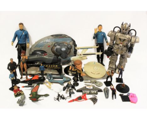 A box of assorted Star Trek and other space themed toys, to include a Star Trek 'The Next Generation' Phaser universal remote