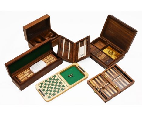 Six wooden boxes containing cribbage, back gammon, dominoes, skittles 