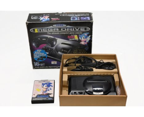 A Sega Megadrive game console and a Sonic the Hedgehog game