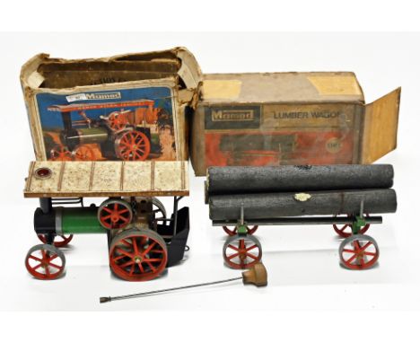 A boxed Mamod TE1A steam traction engine, with a steering rod and burner, plus an LW.1 Lumber Wagon