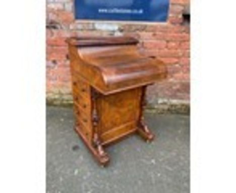 A VICTORIAN BURR WALNUT PIANO TOP DAVENPORT, the pop up top section with a fitted interior, the hinged piano lid opening to a