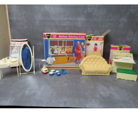 A BOXED PEDIGREE SINDY ACTION KITCHEN, with blender, saucepans, kettle etc., a boxed Pedigree Sindy settee  - box A/F, boxed 