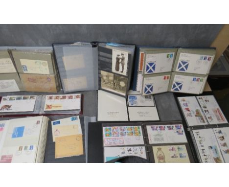 EIGHT ALBUMS OF FIRST DAY COVERS, to include foreign examples, early postcards, Air Mail envelopes, On Active Service envelop