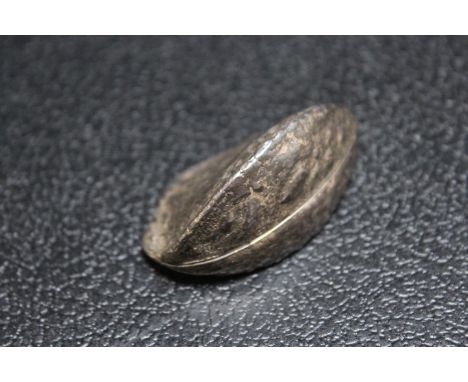 A NOVELTY HALLMARKED SILVER PILL BOX IN THE NATURALISTIC FORM OF A BRAZIL NUT, BY JOHN MARSHALL SPINK - LONDON 1895, approx w