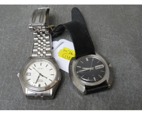 SEIKO BLACK FACE AUTOMATIC DAY DATE 19 JEWELS WRISTWATCH, face Dia. 2.5 cm, together with a Seiko SQ50 wristwatch, face Dia. 