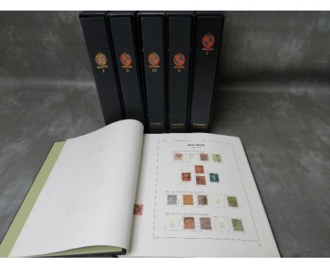 SIX MATCHING STANLEY GIBBONS STAMP ALBUMS AND CONTENTS, in blue hardcases, two of which contain British stamps from Queen Vic