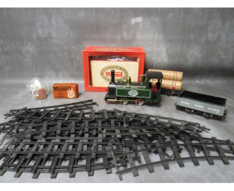 A MAMOD SLI LIVE STEAM TRAIN SET, O gauge, to include boxed steam locomotive, two pieces of rolling stock and track (straight