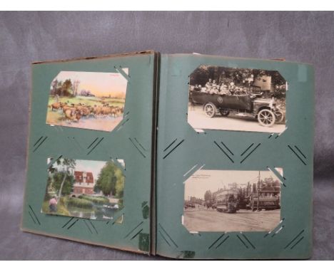 A VINTAGE POSTCARD ALBUM CONTAINING OVER 250 POSTCARDS, to include many pre 1930s examples, subjects include people, views, m
