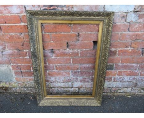 A 19TH CENTURY GILT PICTURE FRAME WITH FOLIATE MOULDED DETAIL, overall 95 x 69 cm, rebate 75 x 50 cm
