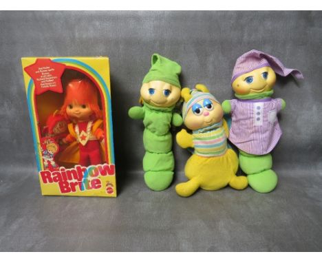THREE UNBOXED EARLY 1980s GLOW WORMS BY HASBRO / PLAYSKOOL, together with a boxed Mattel Rainbow Brite Red Butler and Romeo d